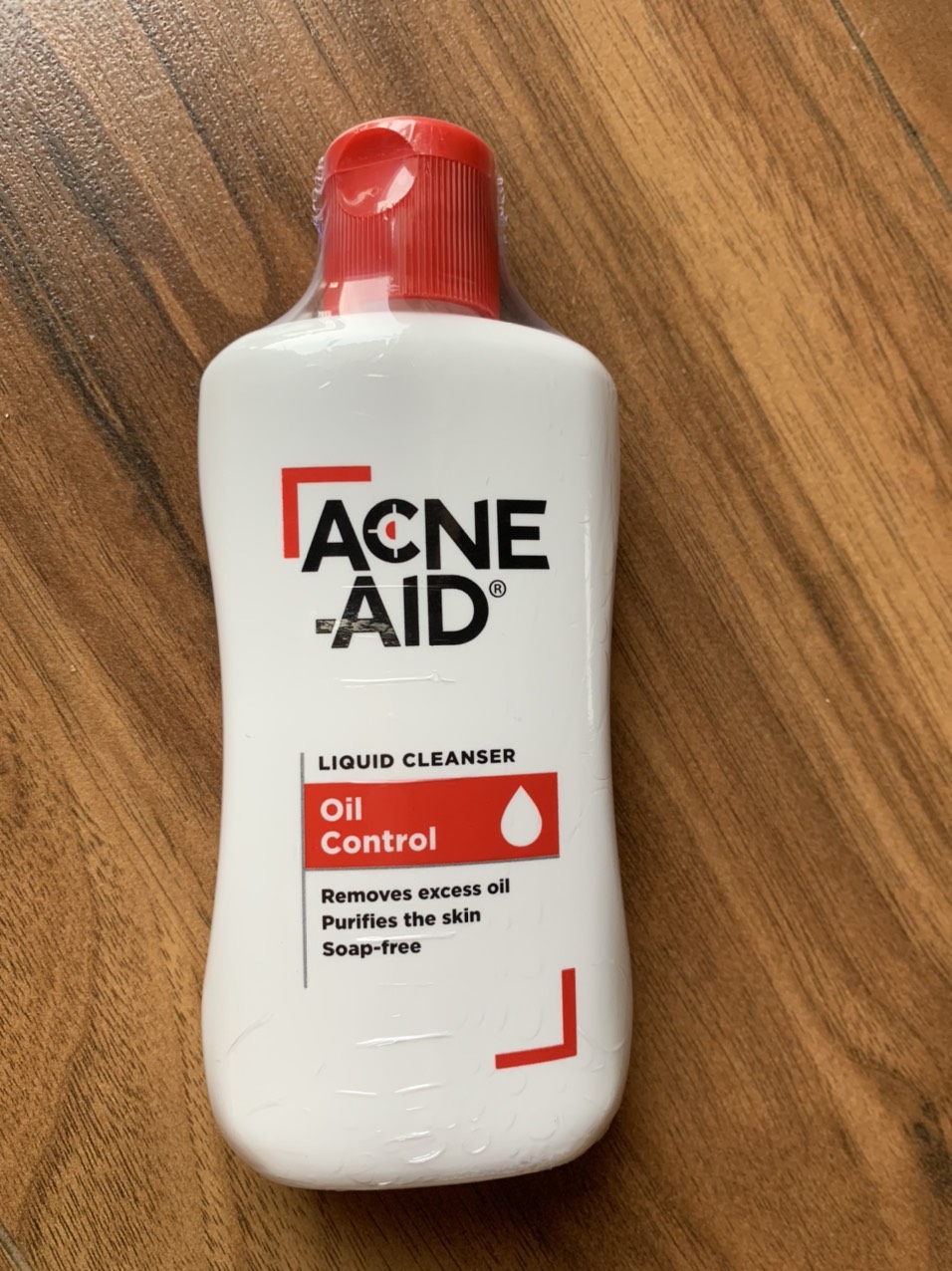 SỮA RỬA MẶT ACNE-AID LIQUID CLEANSER 100ML.