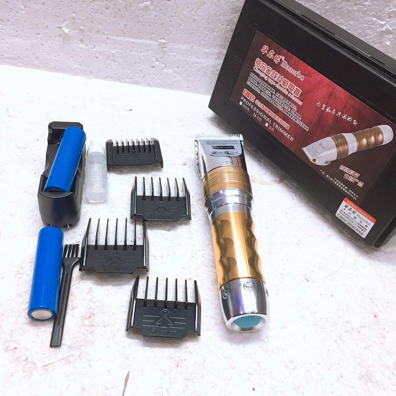 Tông đơ hớt tóc chuyên nghiệp f10 hai pin máy chạy cực trâu tặng lược