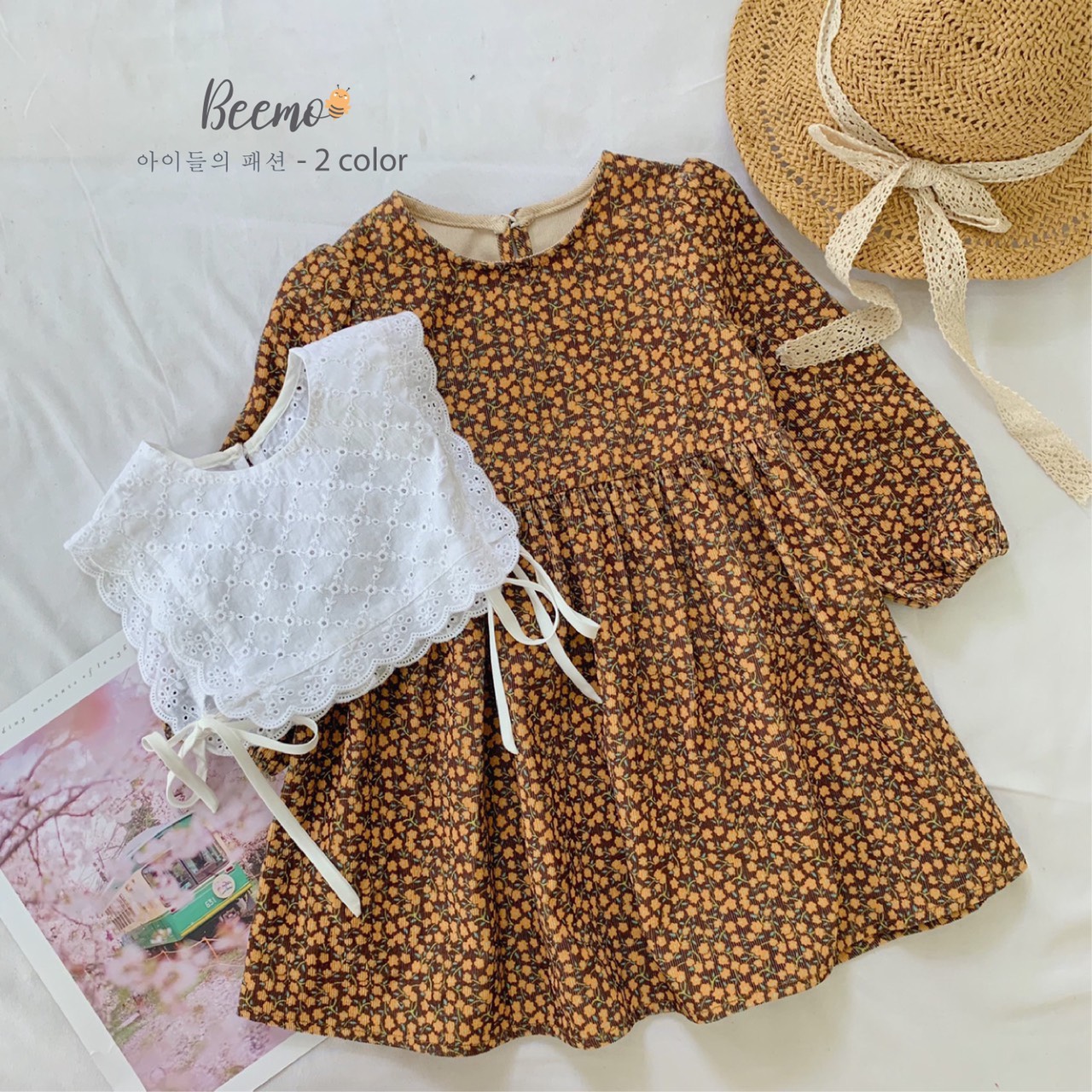 Set váy hoa và yếm bé gái