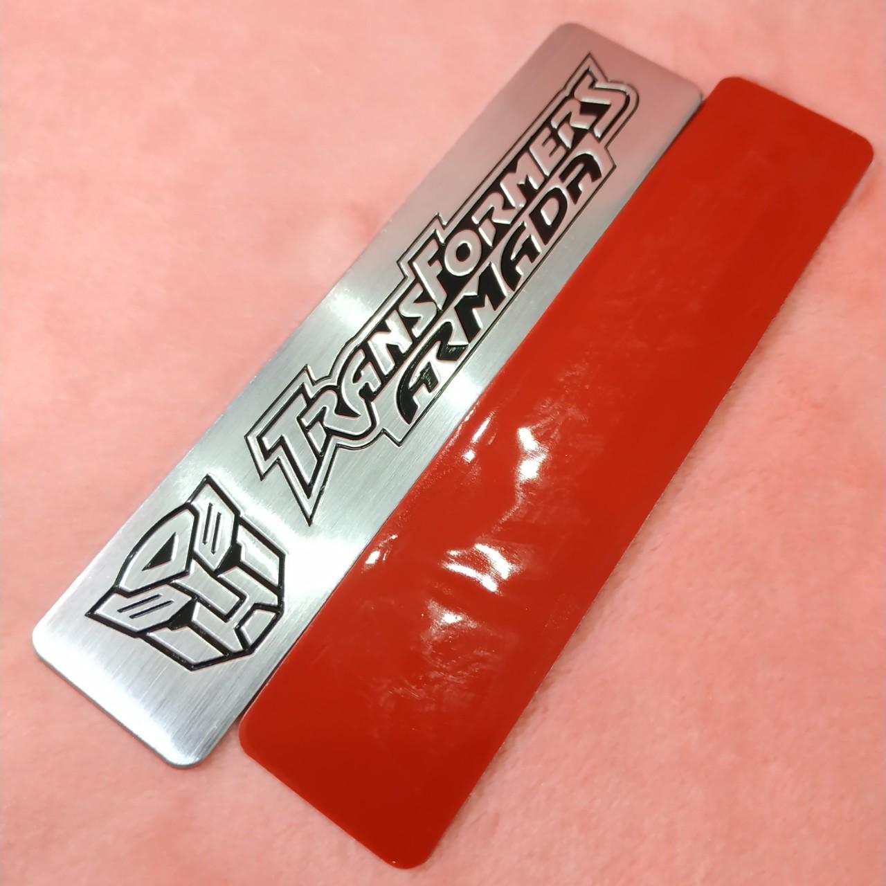 Tem nhôm dán xe TransFormer trắng dài 12x2.6cm