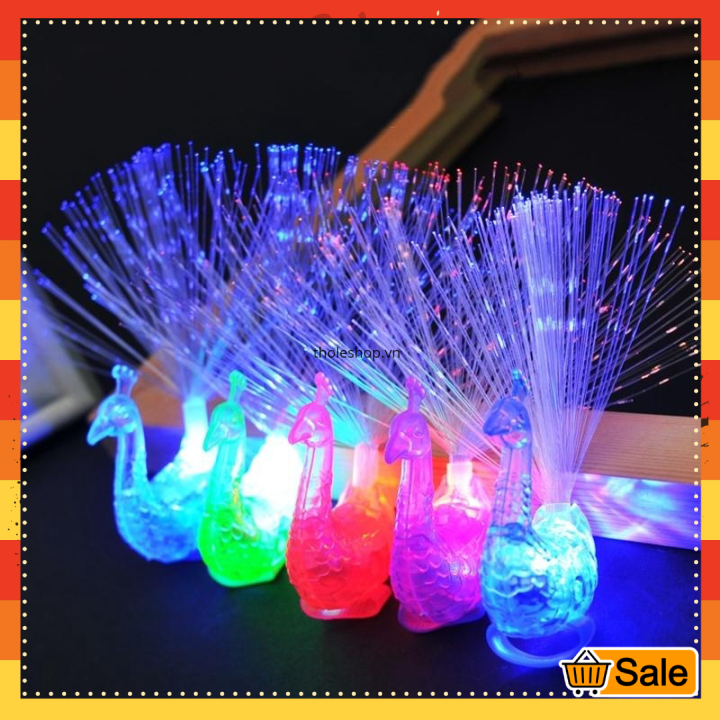 Nhẫn đeo tay - Nhẫn đeo tay hình con công phát sáng nhẫn có đèn Led phát sáng độc đáo hình con công - Đồ chơi trẻ em