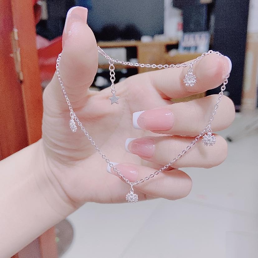 Lắc chân bạc mặt hoa