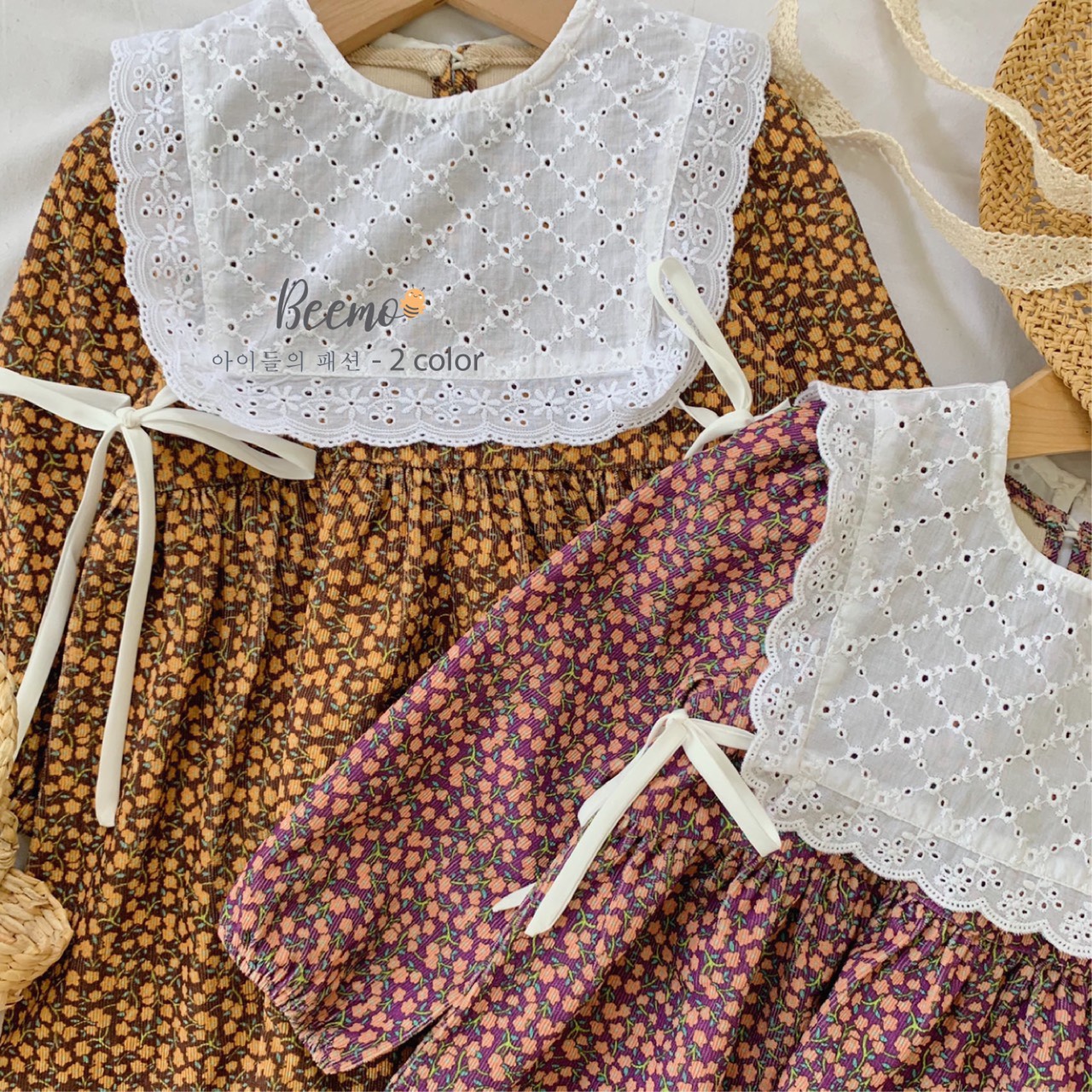 Set váy hoa và yếm bé gái