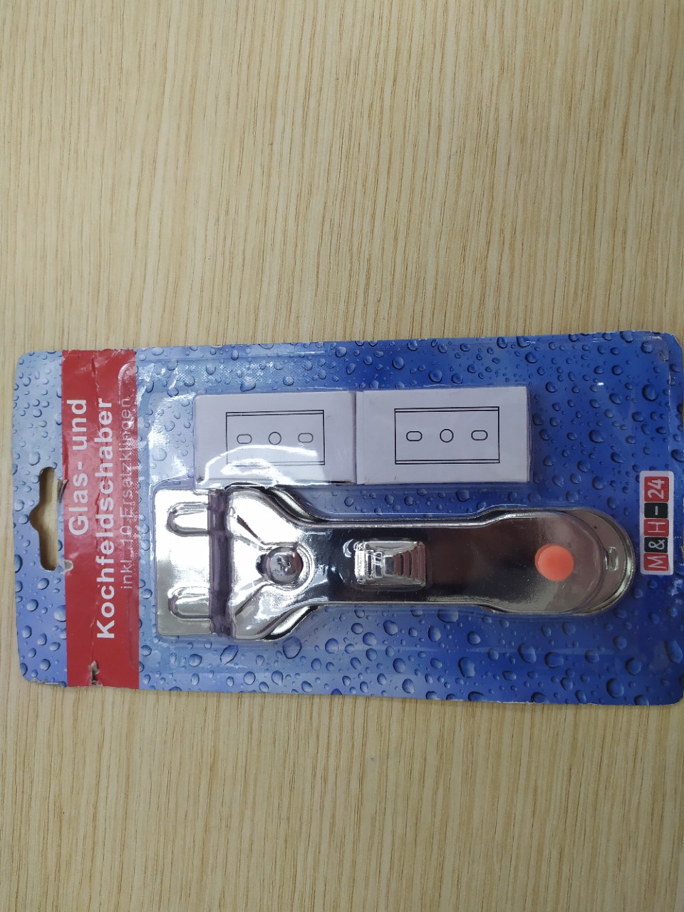 Dao vệ sinh bếp từ Đức Koch