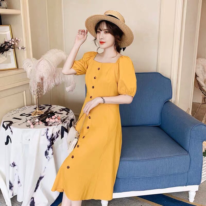 [HCM]ĐẦM VÀNG XÒE NHẸ ĐÍNH NÚT SIÊU XINH