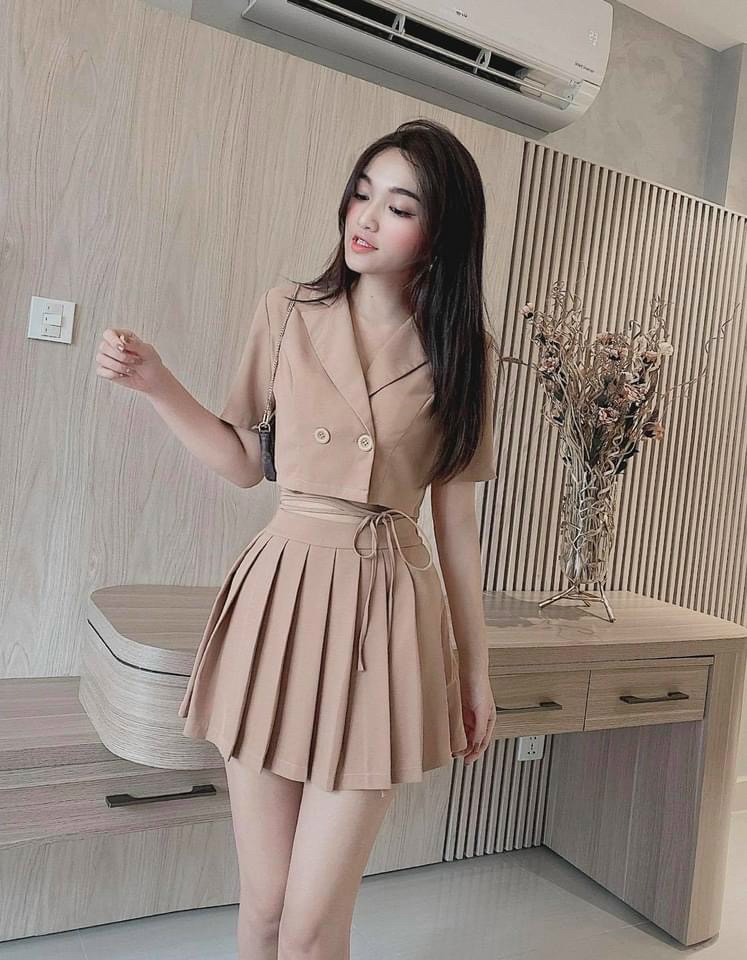 Set bộ áo croptop kèm chân váy cực xinh , chuẩn form , chất liệu tuyết mưa