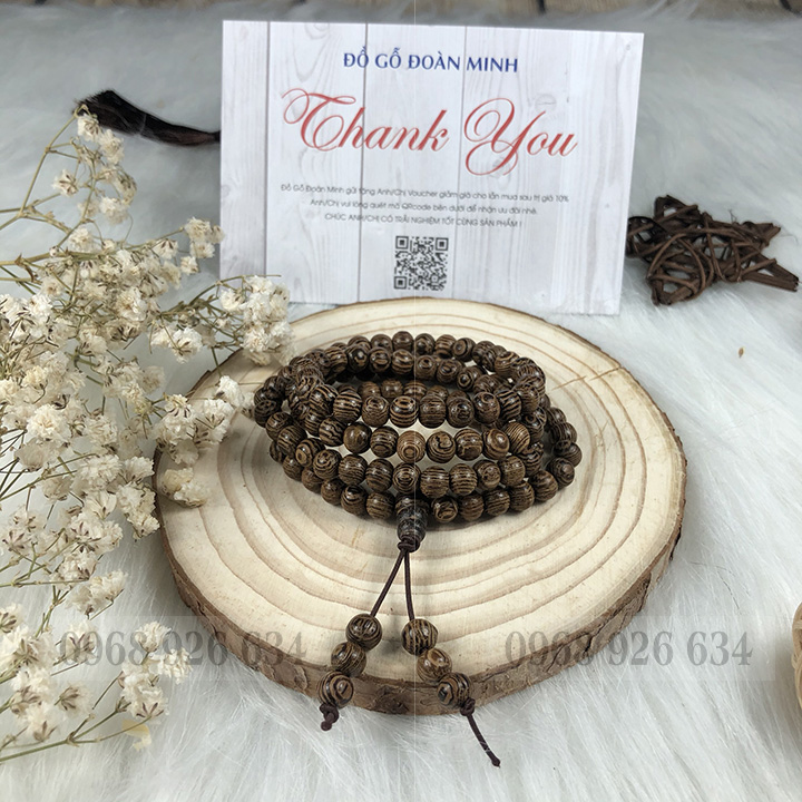 Vòng đeo tay hạt gỗ mun vân lông công - Chuỗi đeo tay gỗ mun 12 ly - Vòng phong thủy mang lại bình an và may mắn