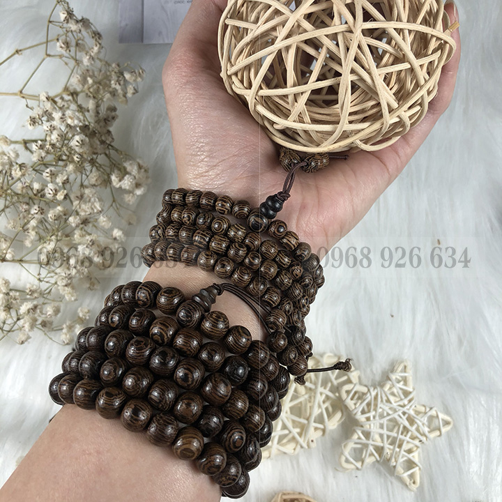 Vòng đeo tay hạt gỗ mun vân lông công - Chuỗi đeo tay gỗ mun 12 ly - Vòng phong thủy mang lại bình an và may mắn