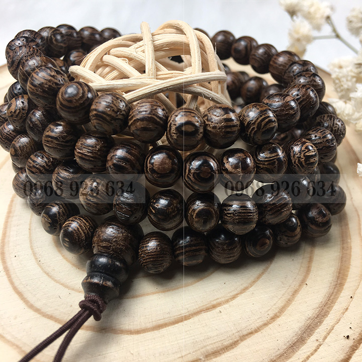 Vòng đeo tay hạt gỗ mun vân lông công - Chuỗi đeo tay gỗ mun 12 ly - Vòng phong thủy mang lại bình an và may mắn